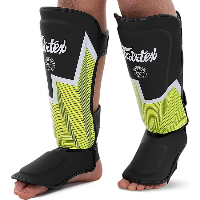 Защитные накладки на ноги Муай Тай, ММА, Кикбоксинг кожаная FAIRTEX BO-9486 (Черный-салатовый)