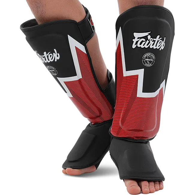 Защитные накладки на ноги Муай Тай, ММА, Кикбоксинг кожаная FAIRTEX BO-9486 (Черный-оранжевый)