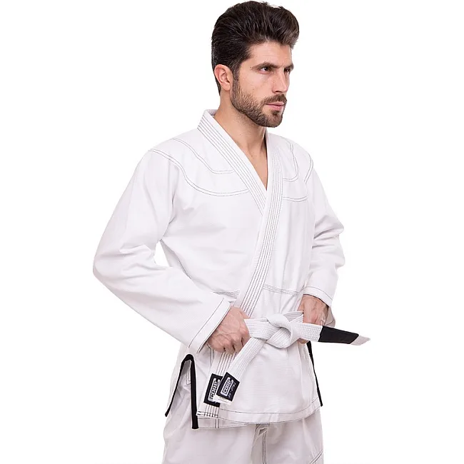 Кимоно для для бразильского джиу-джитсу BJJ белое куртка штаны и пояс CORE CO-3137-A 140 см
-180см