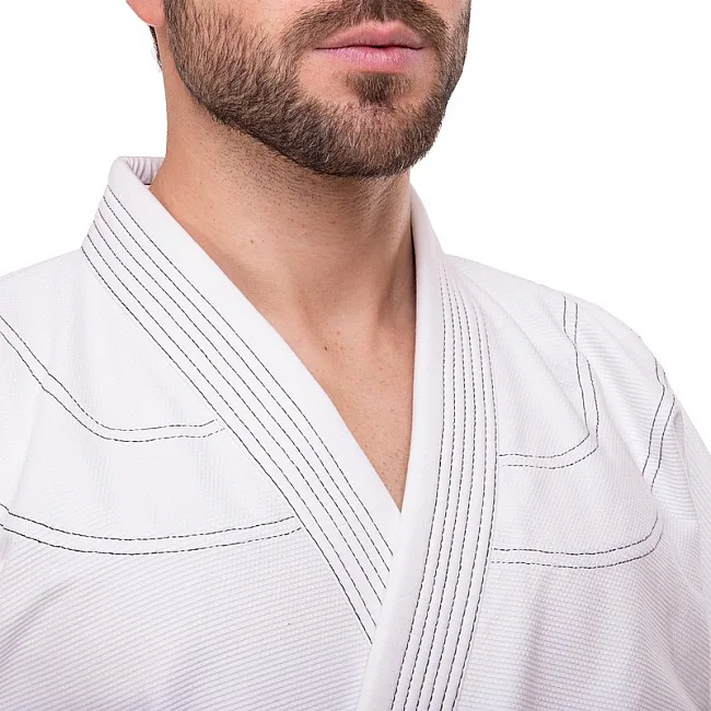 Кимоно для для бразильского джиу-джитсу BJJ белое куртка штаны и пояс CORE CO-3137-A 140 см
-180см