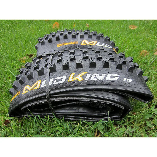 Покрышка на велосипед CONTINENTAL MudKing, 26"x2.30, 57-559, черная, не складная, BlackChili, Apex, Skin, 1100гр.