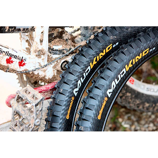 Покрышка на велосипед CONTINENTAL MudKing, 26"x2.30, 57-559, черная, не складная, BlackChili, Apex, Skin, 1100гр.