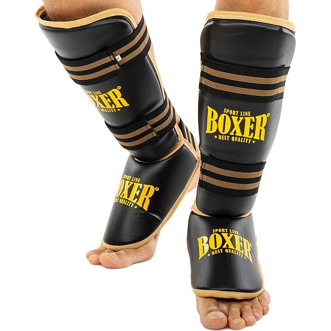 Захисні накладки на ноги
 Муай Тай, ММА, Кікбоксинг штучна шкіра BOXER

 NEW 2004-4-N (Чорний)