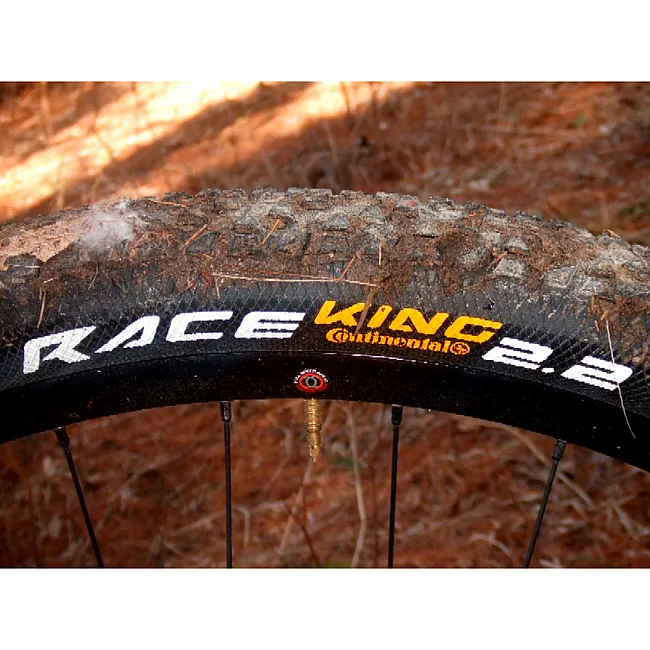 Покрышка на велосипед CONTINENTAL Race King 2.2, 26"x2.20, 55-559, Foldable, PureGrip, ShieldWall System, Skin, 670гр.
