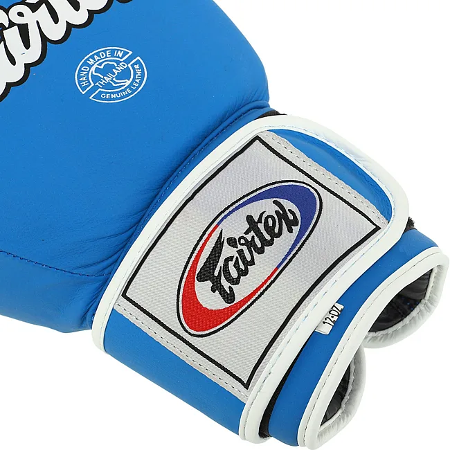Перчатки для бокса


 кожаные FAIRTEX
 F-8577 MATT 12-14унций (Синий-черный)