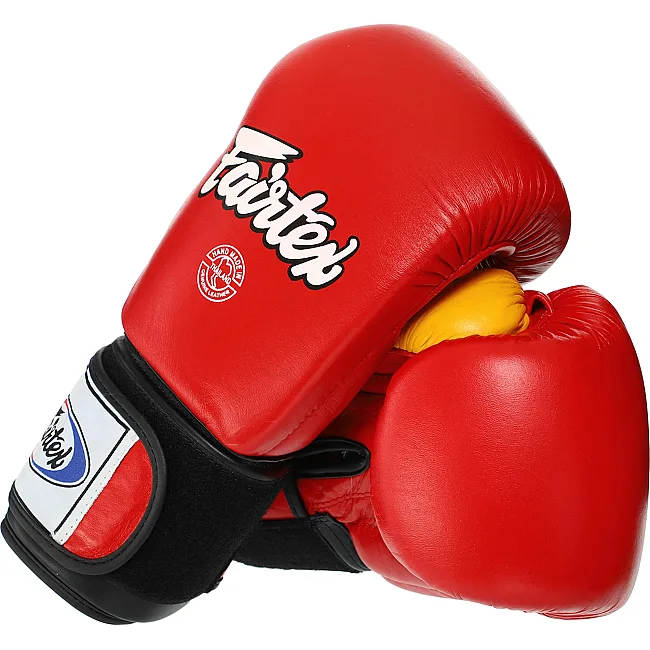 Рукавички для боксу


 шкіряні FAIRTEX
 FTX065 (Синьо-жовтий)