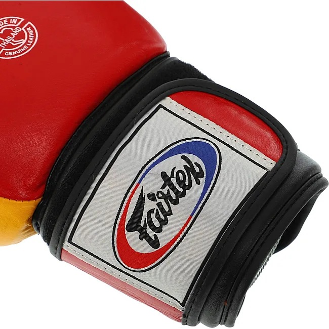 Рукавички для боксу


 шкіряні FAIRTEX
 FTX065 (Синьо-жовтий)