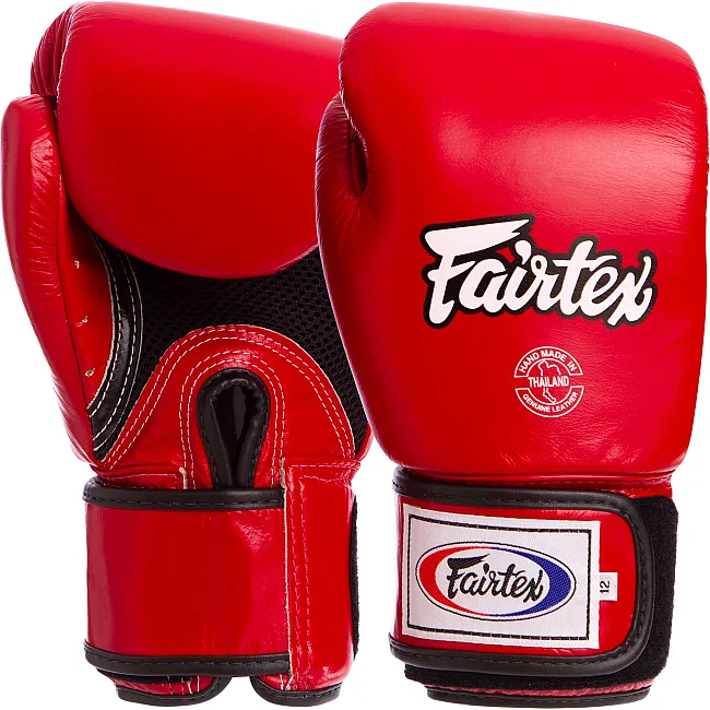 Рукавички для боксу


 шкіряні FAIRTEX BGV1 10-18унцій (Червоний)