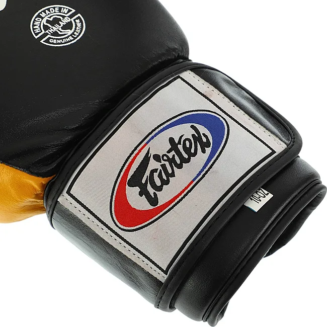 Рукавички для боксу


 шкіряні FAIRTEX
 FTX065 (Синьо-жовтий)